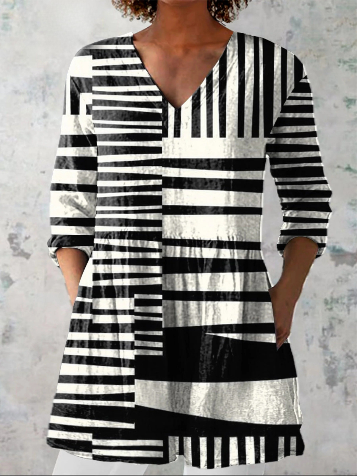 Capri | Blusa lunga a V