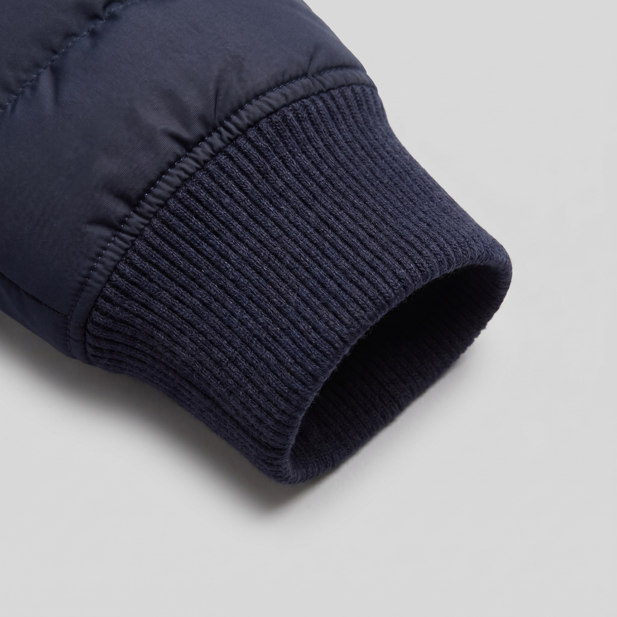 Piumino Uomo con Maniche in Maglia e Collo a Coste
